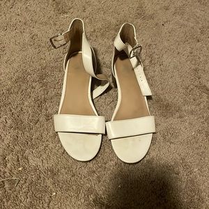 All white two stains in the front of the shoe